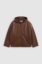 Brown leather zip-up hoodie jacket with front pockets, displayed on a plain white background—this veste vintage combines classic style with modern comfort.