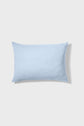A light blue rectangular pillow is shown against a plain white background, casting a soft shadow to the right.