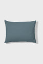 A rectangular blue-gray pillow with a slightly textured fabric, shown against a plain white background.