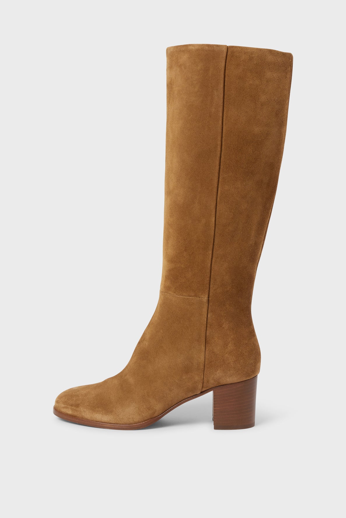 A single tan suede knee-high boot crafted from cuir velours, with a rounded toe and a medium talon carré heel, shown in profile against a plain white background.