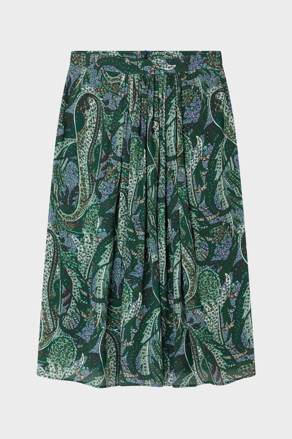 A knee-length green skirt with an all-over paisley and leaf print in shades of green, purple, and white, featuring pleats and a gathered waistband.