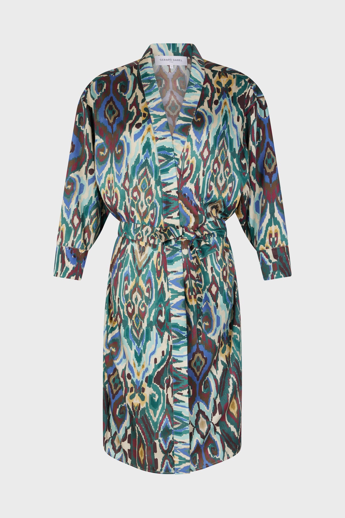 A knee-length robe with long sleeves, a ceinture amovible, and a colorful abstract motif ethnique in blue, green, yellow, brown, and white tones.
