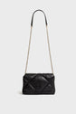 A black quilted leather shoulder bag with a gold chain strap and a leather shoulder section, this elegant sac bandoulière femme features an embossed logo on the front flap. Crafted from luxurious cuir d’agneau, the sac is set against a plain white background for a timeless look.