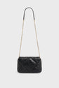 A black quilted sac bandoulière femme in luxurious cuir d’agneau with gold chain straps and a plain leather section at the top, displayed against a plain white background.