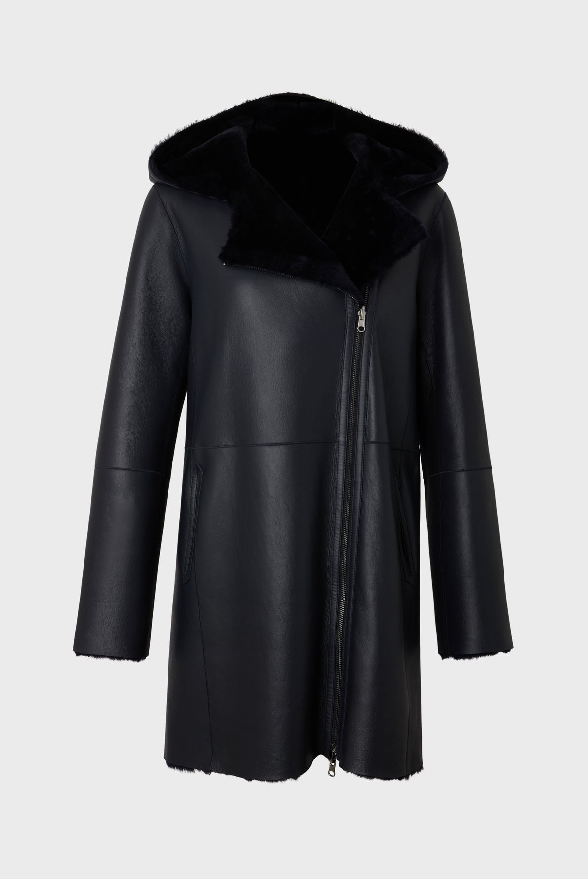 Black cuir silky hooded coat with a soft texture, featuring a front zipper closure, two side pockets, and a visible inner lining. The background is plain and light gray, adding an elegant touch to this manteau zippé style.