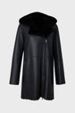 Black cuir silky hooded coat with a soft texture, featuring a front zipper closure, two side pockets, and a visible inner lining. The background is plain and light gray, adding an elegant touch to this manteau zippé style.
