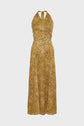 Sleeveless, halter-neck, ankle-length robe longue with a yellow and brown leopard print pattern, featuring a keyhole neckline and a fitted, gathered waist. The dos nu design highlights the back beautifully against the plain white background.