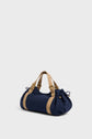 A navy blue GD Canvas duffel-style sac à main toile with tan straps and gold accents, displayed against a plain white background.