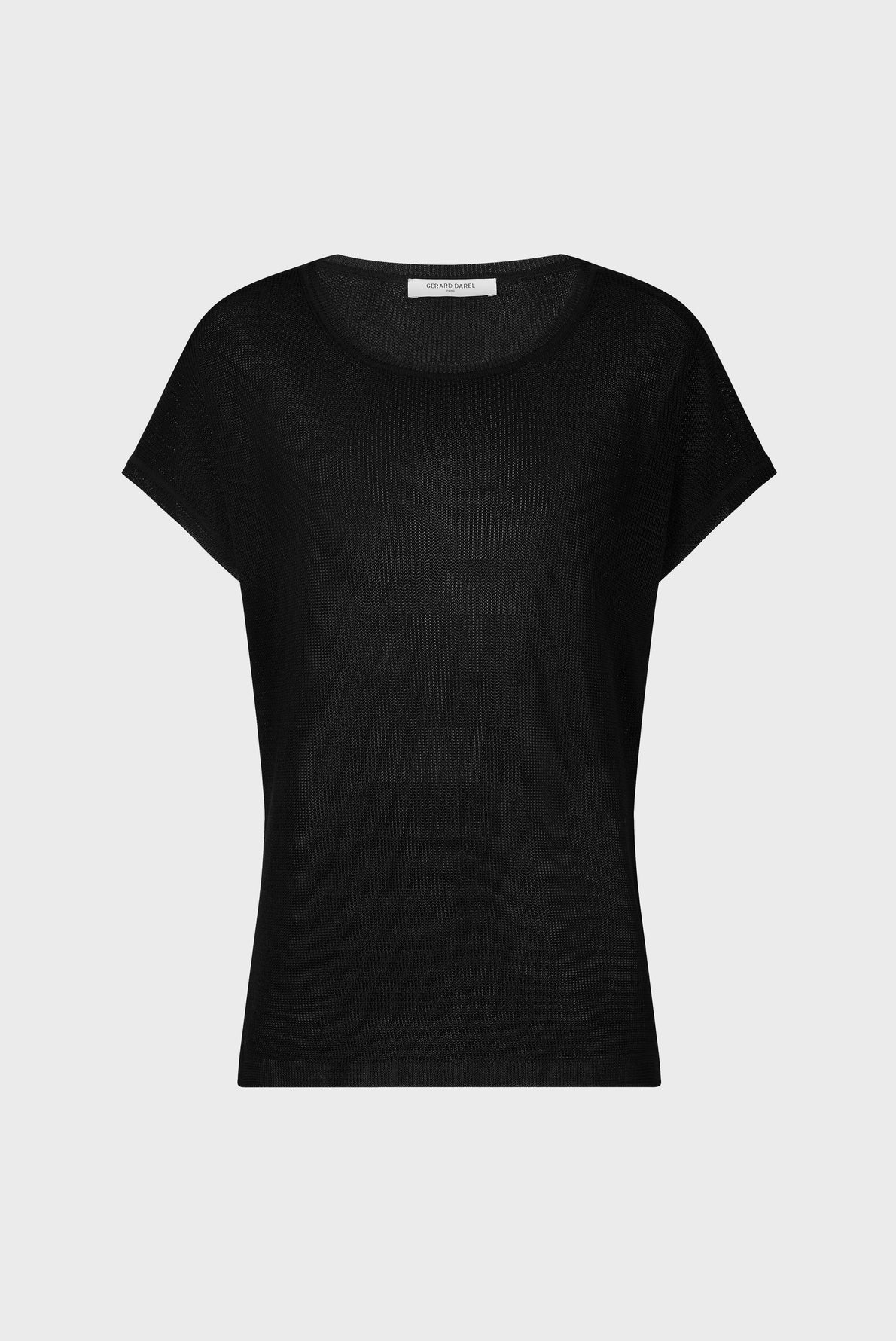 A plain black short-sleeve women’s T-shirt with a round neckline, crafted in maille irisée for a subtle shine, displayed against a light gray background.
