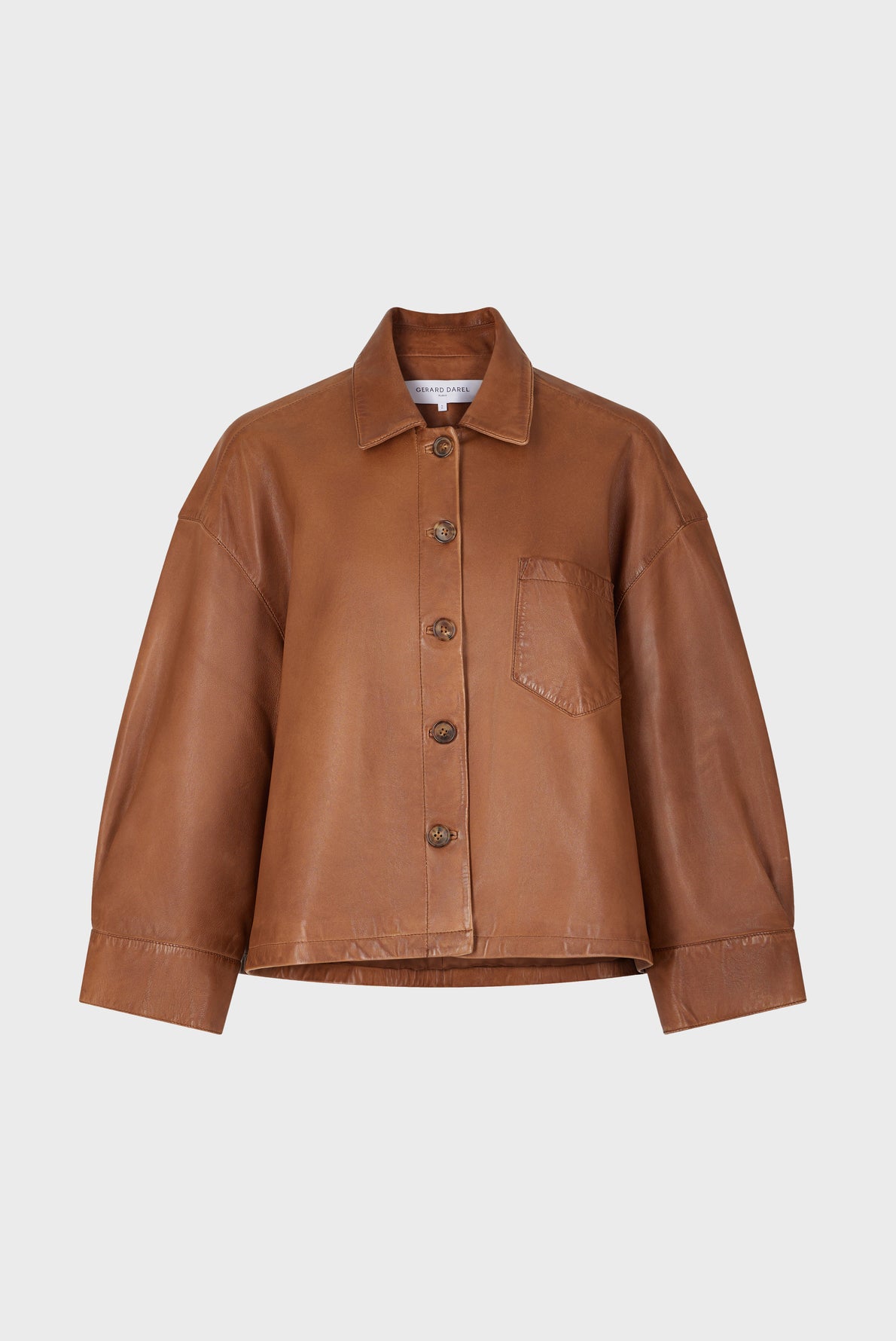 Brown leather veste courte cuir with a collar, front buttons, a single chest pocket, and wide sleeves, displayed on a plain white background.
